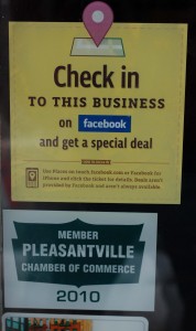 Facebook deals sign on the front door of Cornell Gallery custom frame shop in Pleasantville NY